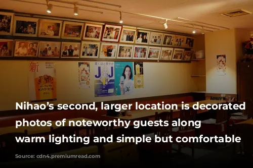 Nihao’s second, larger location is decorated with photos of noteworthy guests along with warm lighting and simple but comfortable furniture. 