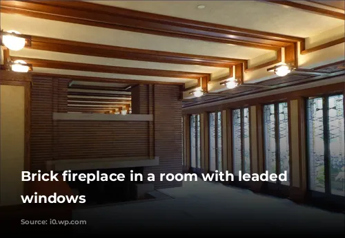 Brick fireplace in a room with leaded light windows