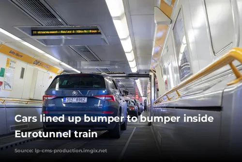 Cars lined up bumper to bumper inside a Eurotunnel train