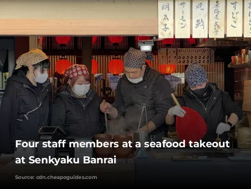 Four staff members at a seafood takeout restaurant at Senkyaku Banrai