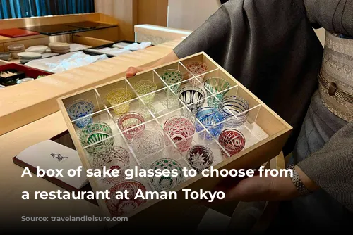 A box of sake glasses to choose from at a restaurant at Aman Tokyo