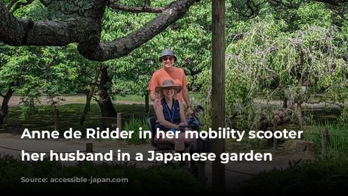 Anne de Ridder in her mobility scooter with her husband in a Japanese garden