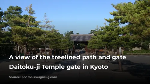 A view of the treelined path and gate at Daitoku-ji Temple gate in Kyoto