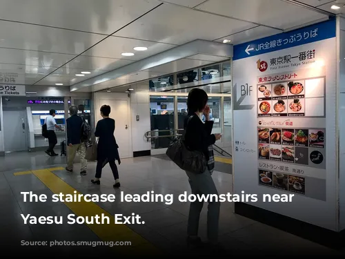 The staircase leading downstairs near the Yaesu South Exit.