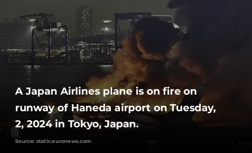 A Japan Airlines plane is on fire on the runway of Haneda airport on Tuesday, January 2, 2024 in Tokyo, Japan.