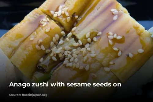 Anago zushi with sesame seeds on top