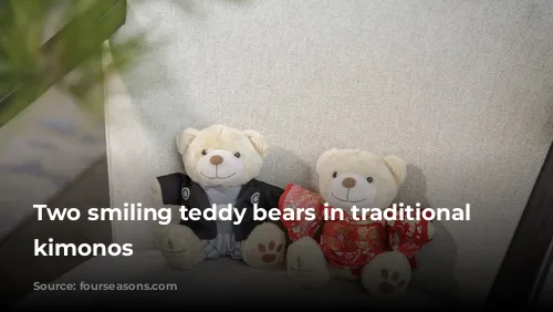 Two smiling teddy bears in traditional Japanese kimonos