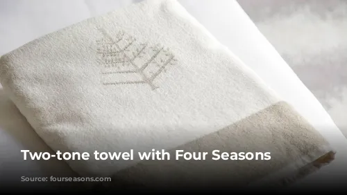 Two-tone towel with Four Seasons logo