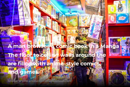 A man browses a comic book in a Manga store. The floor to ceiling walls around the shopper are filled with anime-style comics, toys and games.