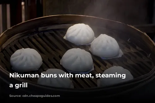  Nikuman buns with meat, steaming on a grill