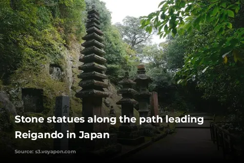 Stone statues along the path leading to Reigando in Japan