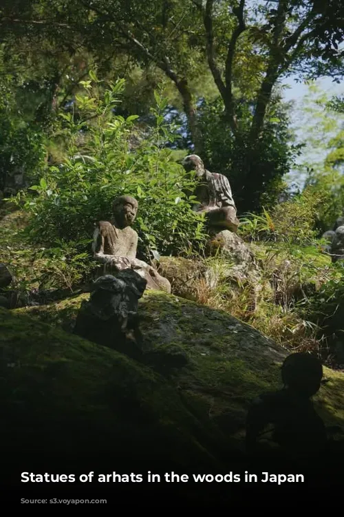 Statues of arhats in the woods in Japan