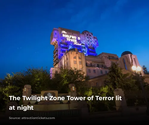 The Twilight Zone Tower of Terror lit up at night