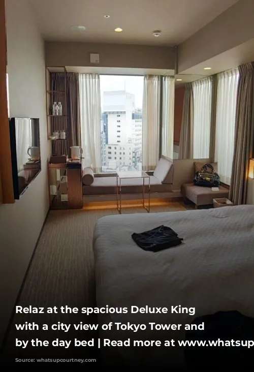 Relaz at the spacious Deluxe King Room with a city view of Tokyo Tower and lounge by the day bed | Read more at www.whatsupcourtney.com