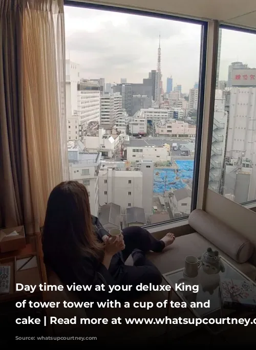 Day time view at your deluxe King Room of tower tower with a cup of tea and delicious cake | Read more at www.whatsupcourtney.com