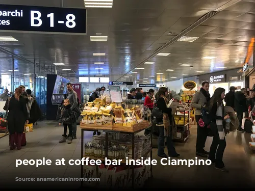 people at coffee bar inside Ciampino airport