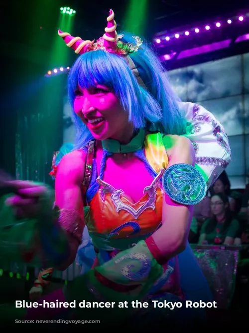 Blue-haired dancer at the Tokyo Robot show