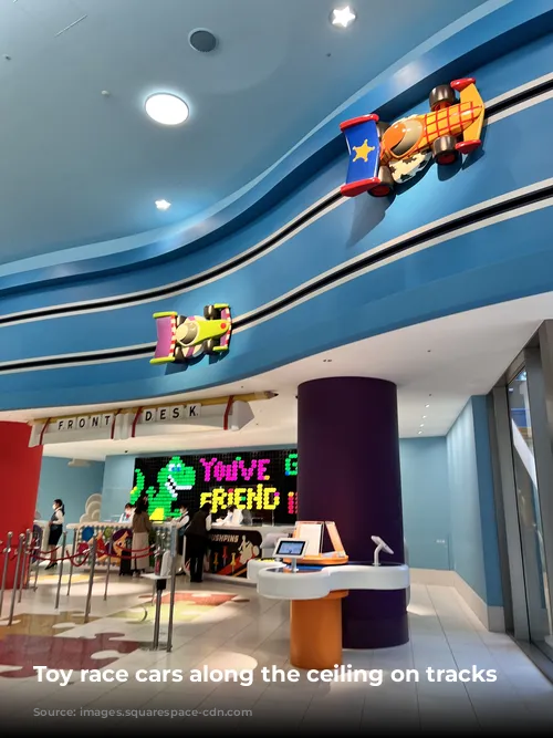  Toy race cars along the ceiling on tracks 