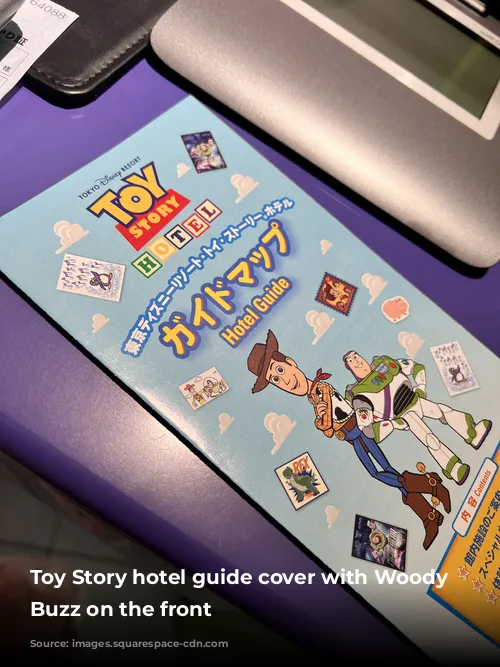  Toy Story hotel guide cover with Woody and Buzz on the front 